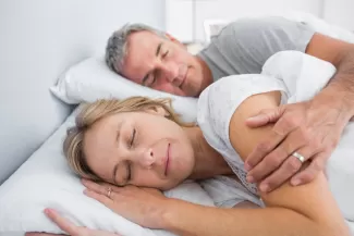 Man and woman sleeping
