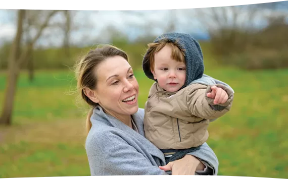 Holding child in the park