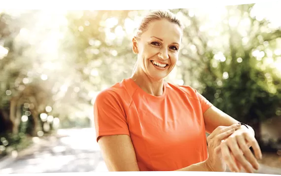 Happy lady in orange tshirt